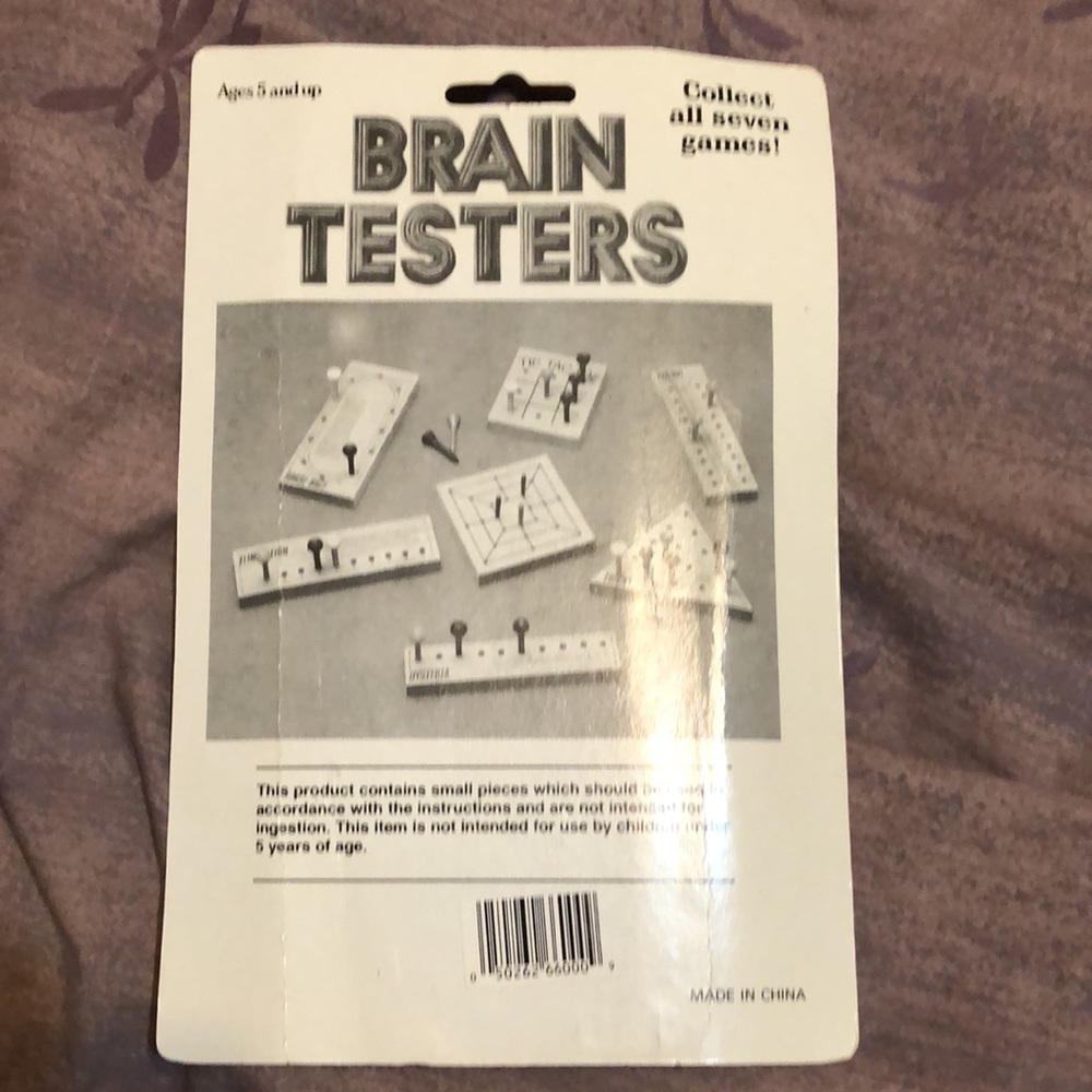 Peg-Out brain teaser game. Fun and challenging. Keep on the coffee table. - Picture 2 of 6